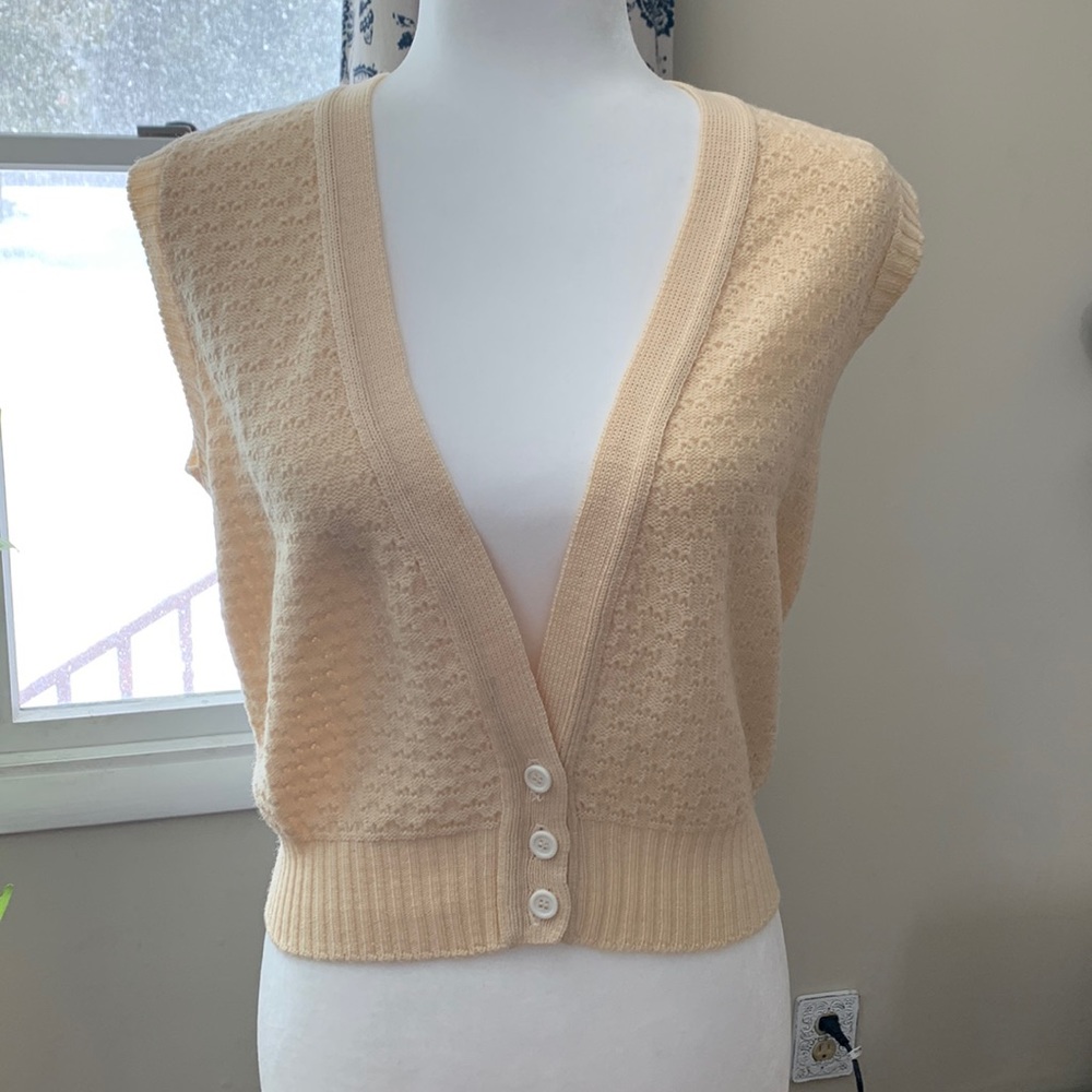 Yellow wool pullover.